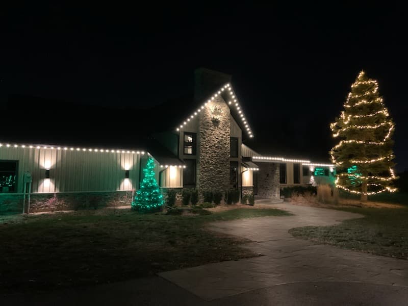 Front of a holiday-decorated home in St Thomas Ontario by We Install Christmas Lights